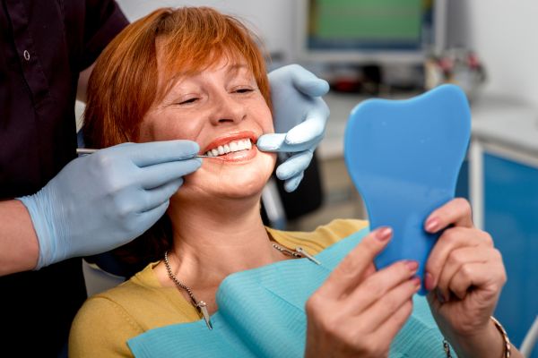 Dental Implants Vs  Dentures