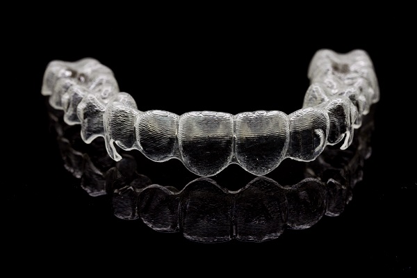 Does Wearing Invisalign® Invisible Braces Hurt? - Palm Beach Dentistry  Delray Beach Florida