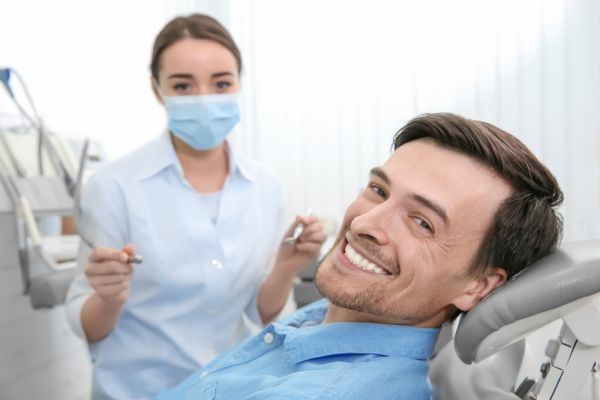 How A Restorative Dentist Can Improve Your Smile